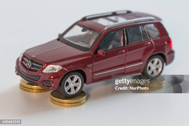 Model car is seen with Euro currency units.