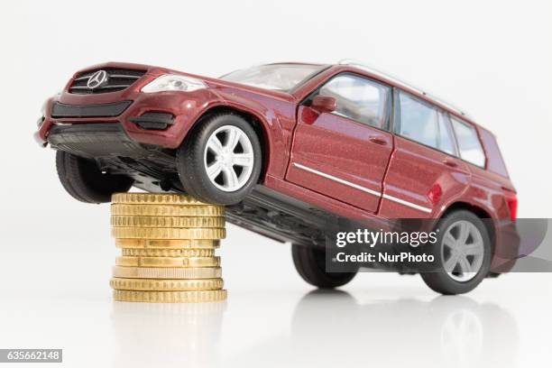 Model car is seen with Euro currency units.