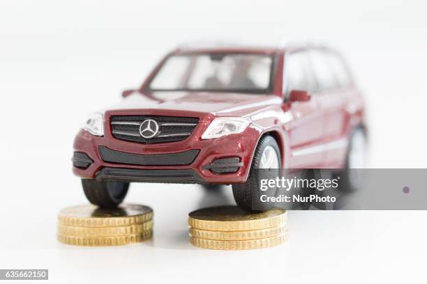 Model car is seen with Euro currency units.