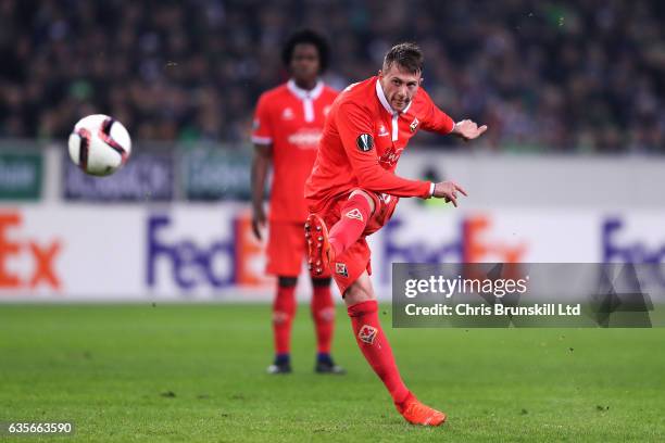 Federico Bernardeschi of ACF Fiorentina scores the opening goal during the UEFA Europa League Round of 32 first leg match between Borussia...