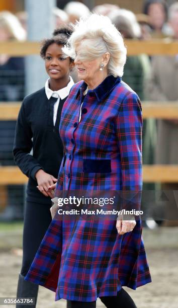 Camilla, Duchess of Cornwall's hair is blown in the wind as she visits the Ebony Horse Club riding centre to celebrate the club's 21st anniversary on...