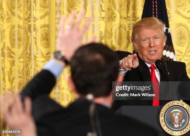 President Donald Trump speaks during a news conference announcing Alexander Acosta as the new Labor Secretary nominee in the East Room at the White...