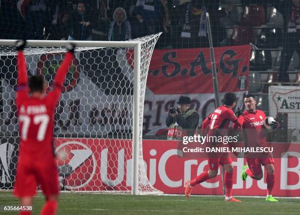 Constantin Budescu of Astra Giurgiu celebrates after he scored 1-1 during the UEFA Europa League round of 32 first-leg football match between FC...