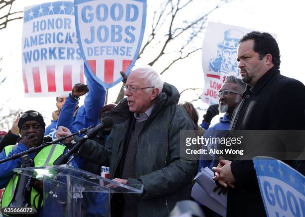 Sen. Bernie Sanders speaks as former president and CEO of NAACP Ben Jealous looks on during a rally "to fight-back against the Republican war on the...