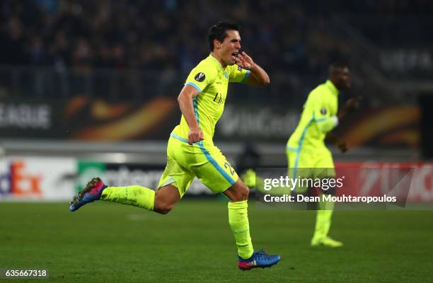 Jeremy Perbet of KAA Gent celebrates after scoring his sides first goal during the UEFA Europa League Round of 32 first leg match between KAA Gent...