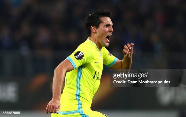Jeremy Perbet of KAA Gent celebrates after scoring his sides first goal during the UEFA Europa League Round of 32 first leg match between KAA Gent...