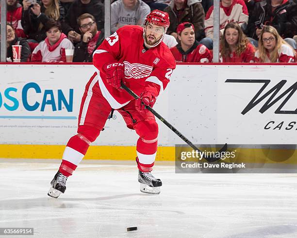 Brian Lashoff of the Detroit Red Wings passes the puck during an NHL game against the Arizona Coyotes at Joe Louis Arena on December 13, 2016 in...