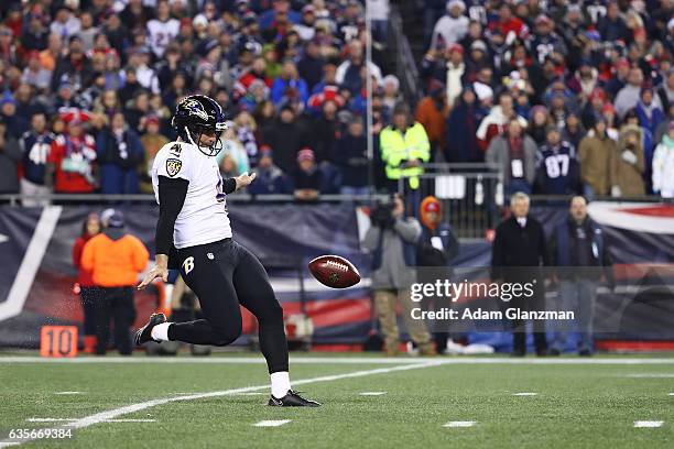 Sam Koch of the Baltimore Ravens punts during the first half against the New England Patriots at Gillette Stadium on December 12, 2016 in Foxboro,...