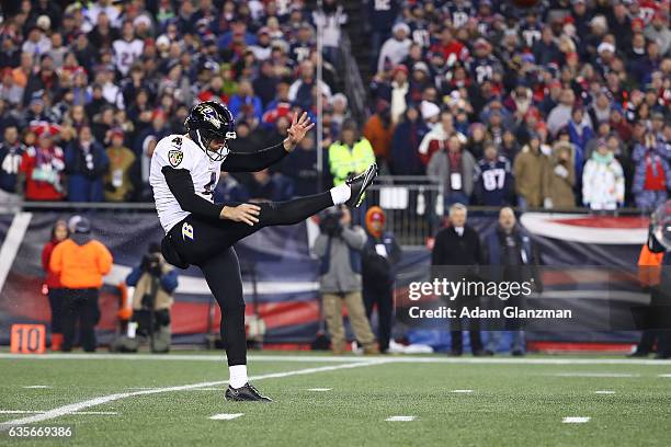 Sam Koch of the Baltimore Ravens punts during the first half against the New England Patriots at Gillette Stadium on December 12, 2016 in Foxboro,...