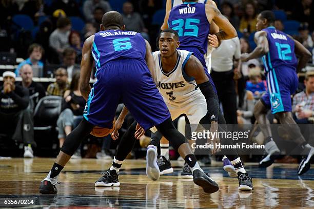 Kris Dunn of the Minnesota Timberwolves guards against Rasheed Sulaimon of the Charlotte Hornets during the preseason game on October 21, 2016 at...