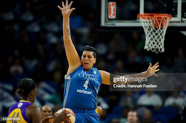 Janel McCarville of the Minnesota Lynx defends against Jantel Lavender of the Los Angeles Sparks in Game Two of the 2016 WNBA Finals on October 11,...