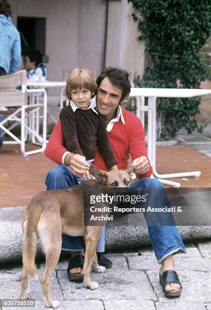 Walter Chiari Italian actor, comician and TV host and his son Simone - the child he had with the Italian singer and actress Alida Chelli - petting...