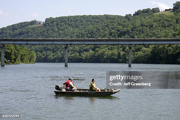 Man and woman freshwater fishing on White River.