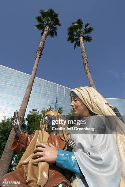 Chrome child Jesus statue held by Mary outside the Crystal Cathedral.