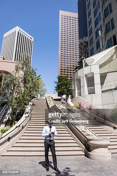 Businessman at the bottom of the Bunker Hill Steps.