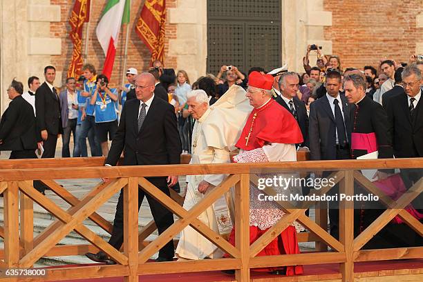 Pope Benedict XVI visiting Venice. The pontiff, accompanied by Angelo Scola, Cardinal and Patriarch of Venice, going to the meeting with the worlds...