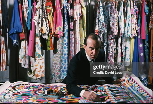 The Florentine fashion designer, Emilio Pucci with examples of his work, Florence, Italy, 1959.