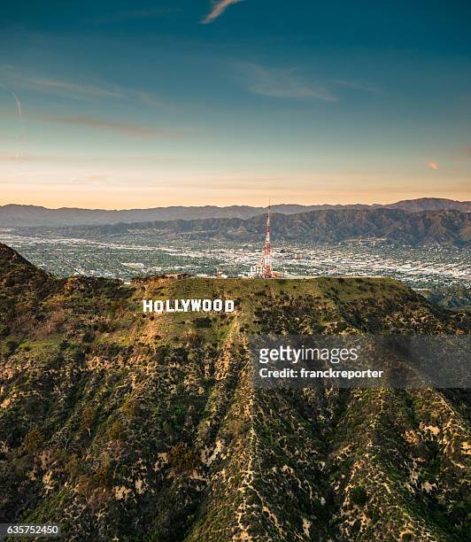 aerial view of the hollywood sign at dusk - hollywood sign stock pictures, royalty-free photos & images