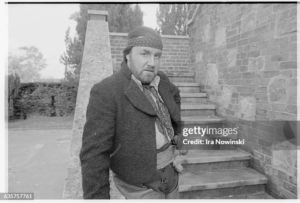 Gordon Sandison poses on the steps of the opera house. His character in the opera Carmen is Le Dancire, a smuggler who employs Carmen as decoy....