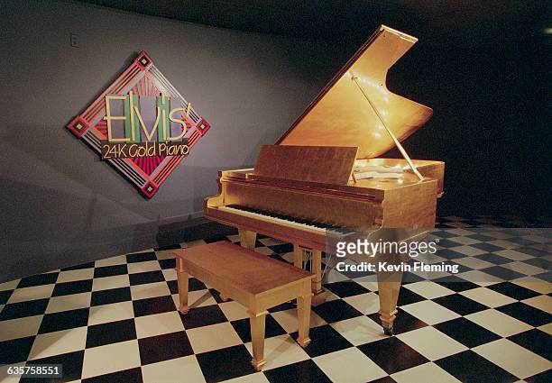 The 24K gold piano which Priscilla Presley gave to Elvis on their first anniversary is on display at the Country Music Hall of Fame and Museum in...