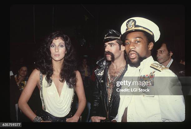 Cher with the Village People.