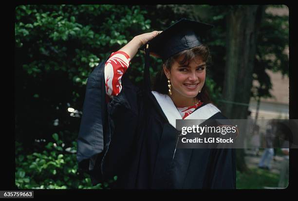 Actress Brooke Shields wears a mortarboard and gown on her graduation day at Princeton University.