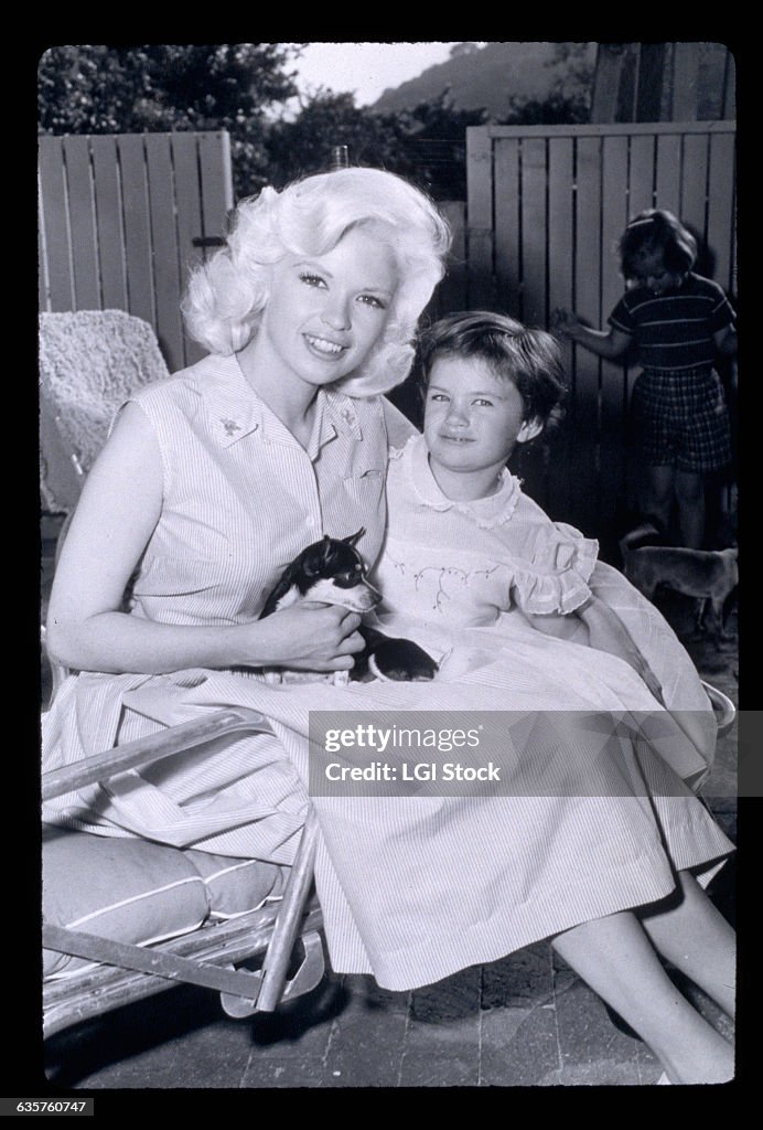 Bombshell Jayne Mansfield and her daughter Jayne Marie with a pet