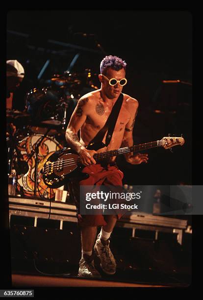 Flea plays bass with the Red Hot Chili Peppers at Woodstock '94.