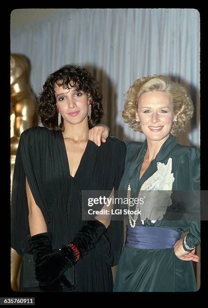 Actresses Glenn Close and Jennifer Beals pose together at the Academy Awards.