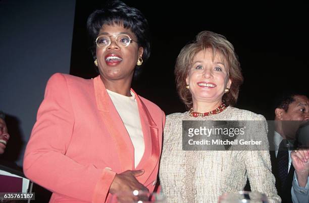 New York, NY-Talk show hosts Oprah Winfrey and Barbara Walters are shown at the Matrix Awards at the Waldorf Astoria in New York.