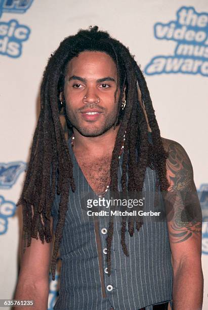 New York, New York: Picture shows Lenny Kravitz fromthe waist up at the VH-1 Music Awards. He is wearing a vest and smiling.