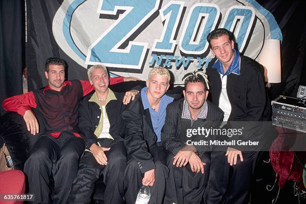 Members of N'Sync pose together backstage at Z-100's "Z-Day: New York City's 100th Birthday Blast".