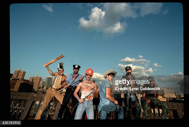 The Village People are: Alexander Briley , David Hodo , Glenn Hughes , Randy Jones , Felipe Rose , and Victor Willis .