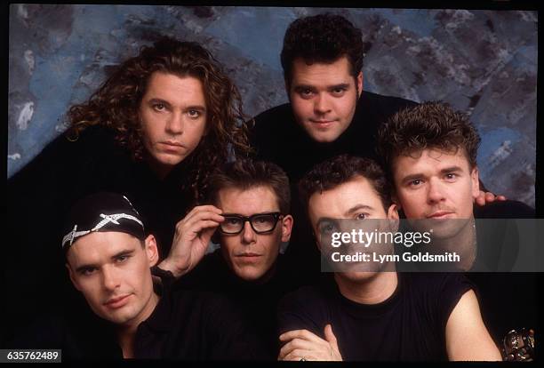 Lead singer Michael Hutchence with INXS band members, clockwise from top right: Andrew Farriss, Tim Farriss, Garry Gary Beers, Kirk Pengilly, and Jon...