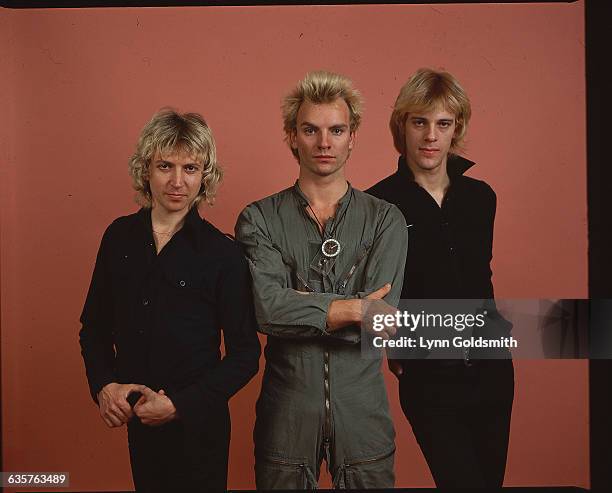 Sting, center, in flight suit, flanked by Stewart Copeland and Andy Summers .