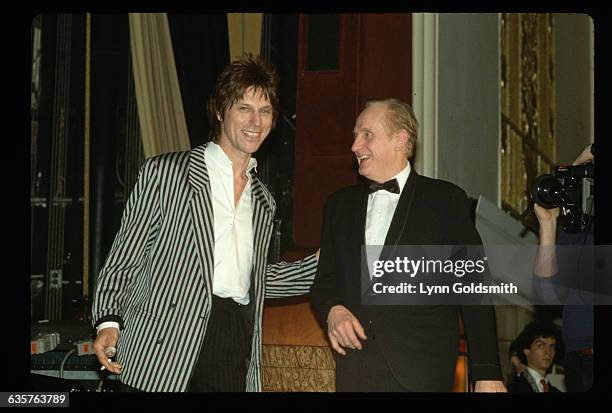 Guitarists Jeff Beck and Les Paul, waist-up. Photograph, 1988.