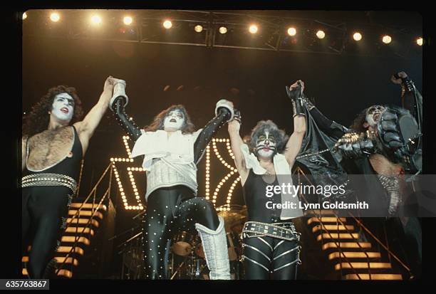 Members of the glam-rock band take their bow after a performance. They are, L-R: Gene Simmons, Peter Criss, Ace Frehley and Paul Stanley. Photo circa...