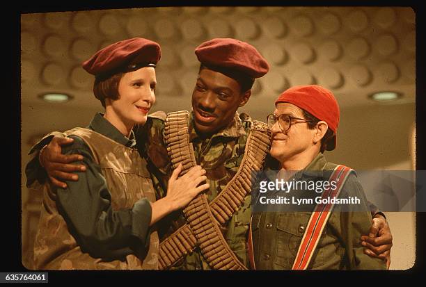 Comedians Mary Gross, Eddie Murphy, and Tim Kazurinsky perform in a Saturday Night Live skit.
