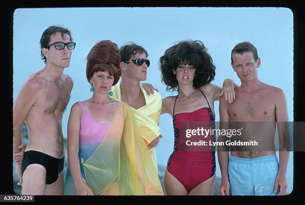 The members of the new wave band the B-52s pose in bathing suits