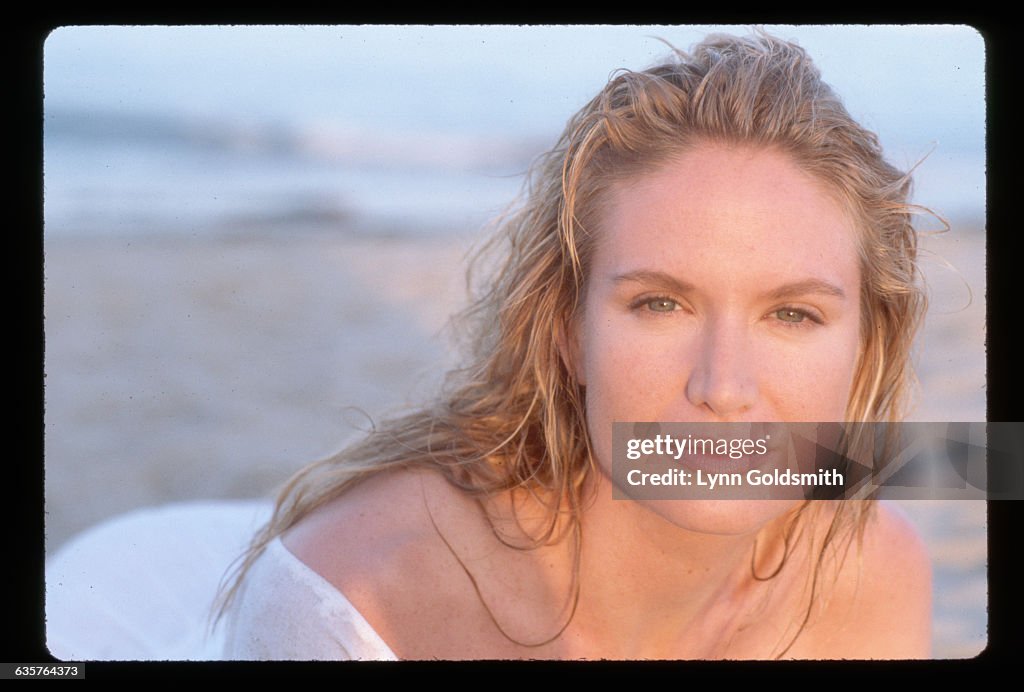 Actress Kelly Lynch On A Beach