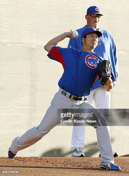 United States - The Chicago Cubs' Japanese pitcher Kyuji Fujikawa practices on March 3 during the MLB club's spring training in Mesa, Arizona, as...