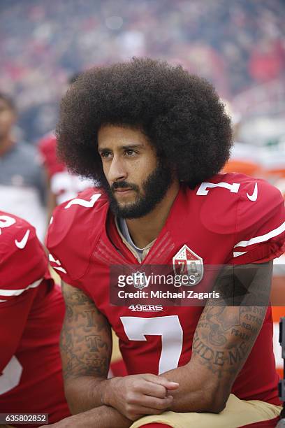 Colin Kaepernick of the San Francisco 49ers kneels on the sideline, during the anthem, prior to the game against the New York Jets at Levi Stadium on...