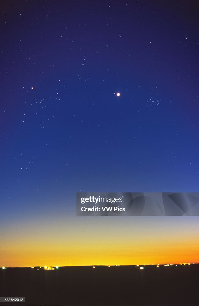 Venus near Pleiades and Hyades star clusters in evening twilight