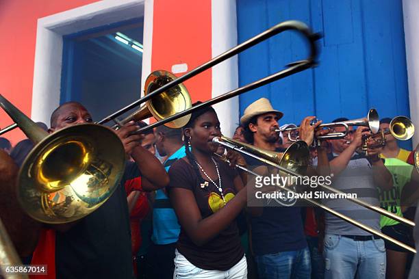 Cubans celebrate Christmas Eve with the festival of Las Parrandas de Remedios, where the two neighborhoods of the town, San Salvador, represented by...