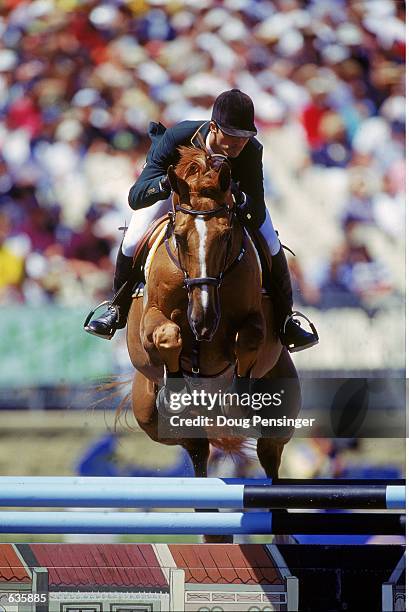 Rodrigo Pessoa of Cuba jumps his horse Baloubet Du Rouet in the Individual Three Day Event Jumping during the Sydney 2000 Olympic Games at the Sydney...