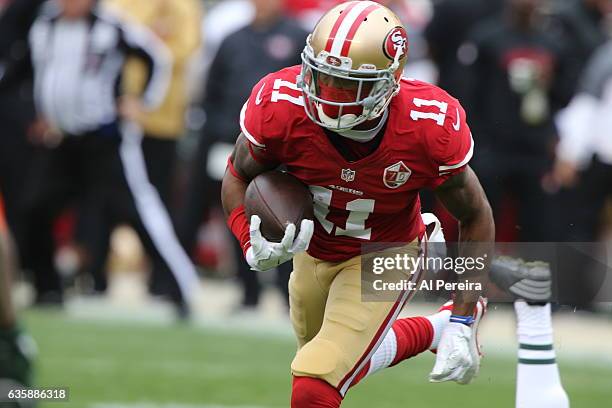 Wide Receiver Quinton Patton of the San Francisco 49ers has a big gain against the New York Jets at Levi's Stadium on December 11, 2016 in Santa...