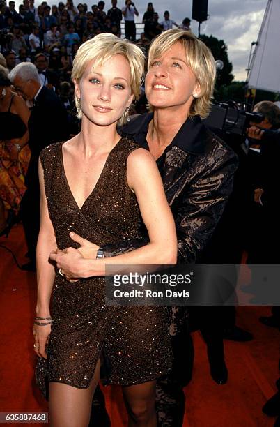 Actress Anne Heche and comedienne Ellen DeGeneres attend the 49th Annual Primetime Emmy Awards on September 14, 1997 at the Pasadena Civic Auditorium...