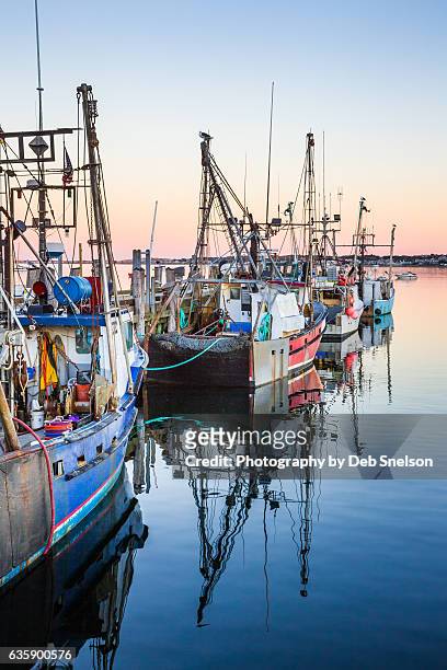 fishing vessels after a long day - provincetown stockfoto's en -beelden