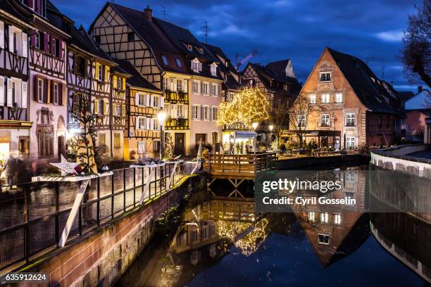 quai de la poissonnerie in colmar during blue hour - de colmar stock pictures, royalty-free photos & images