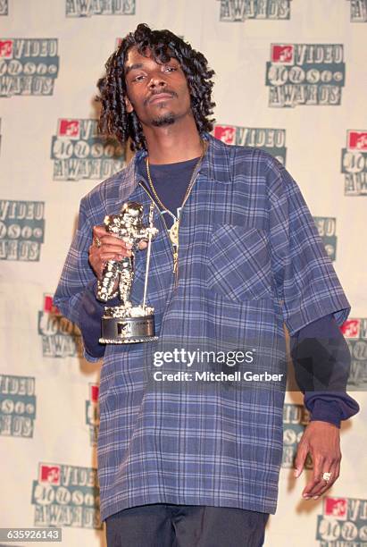 Rap artist Snoop Doggy Dogg holds an award received at the 1994 MTV Video Music Awards at Radio City Music Hall.